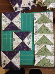 Some hourglass blocks and flying geese